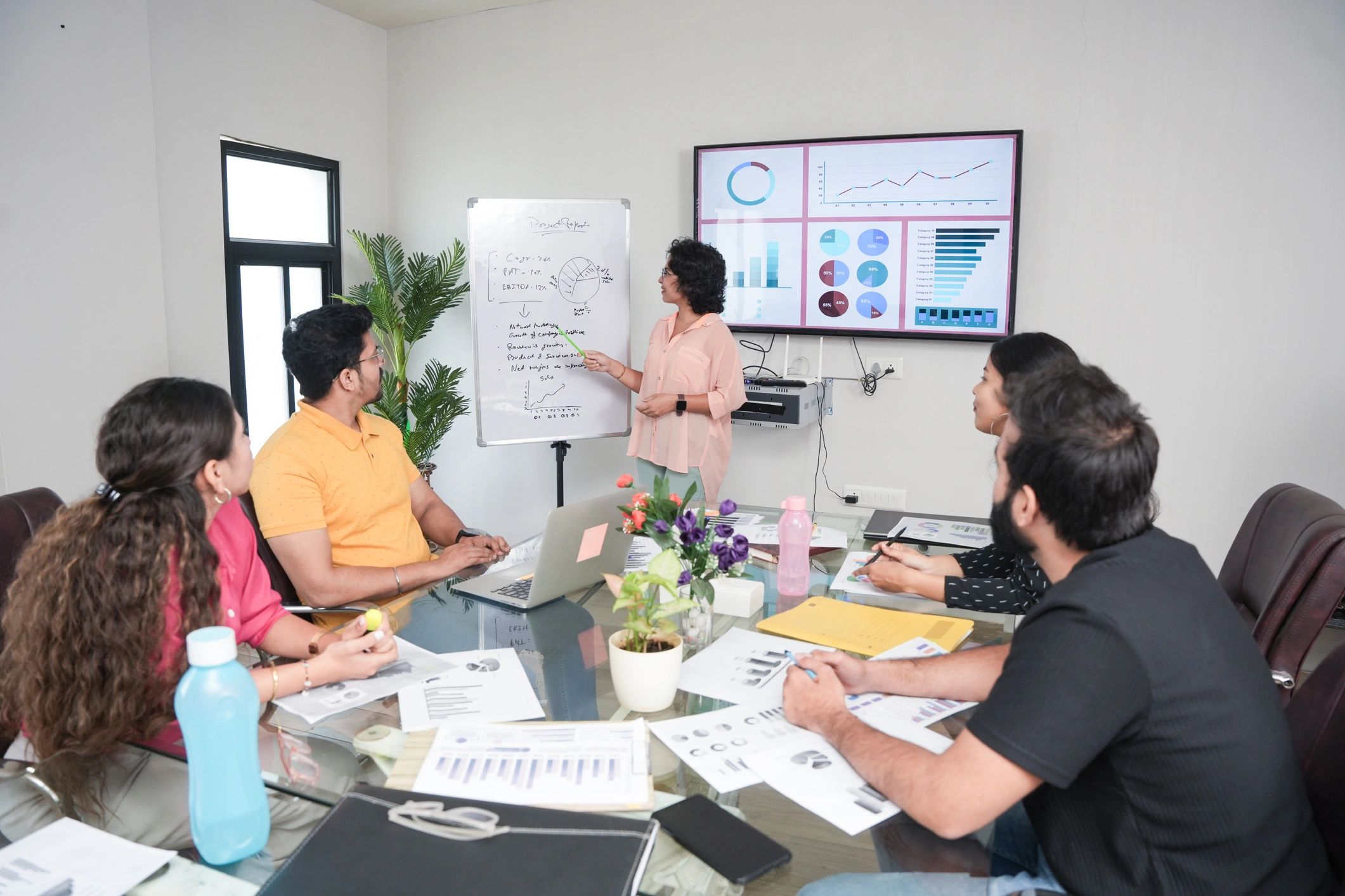 Nonprofit team planning and reviewing progress together