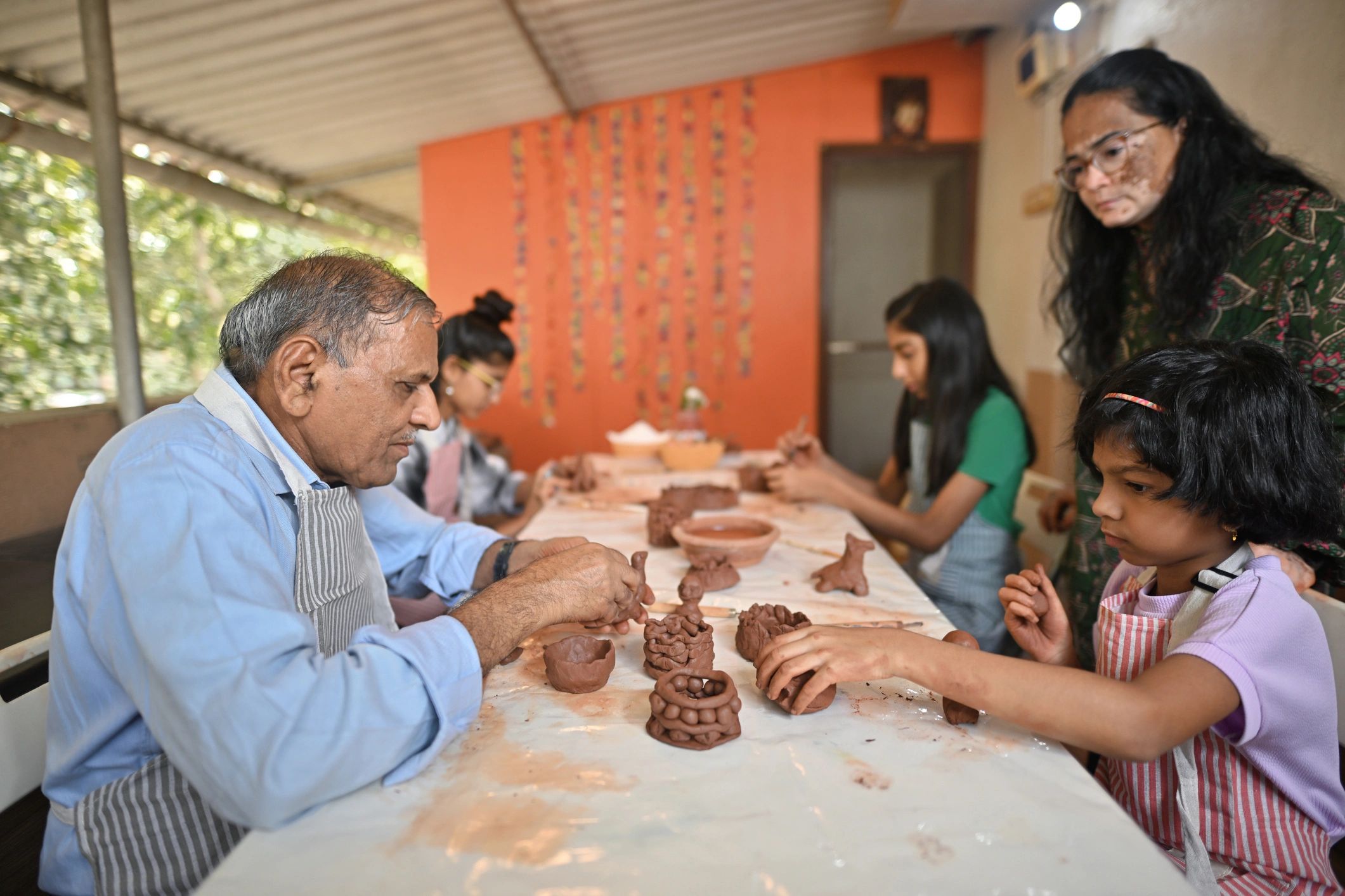 Participants learning skills in a workshop setting
